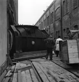 Tre män arbetar med montering av STAL-turbinen på Papyrus, 25/4-1951.
Fr. v. John Brandberg, Okänd, Okänd, Okänd, Okänd.