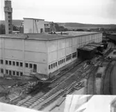 Lagerbyggnad 110 och 111 under uppbyggnad på Papyrus fabriksområde, 20/8-1946.