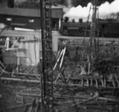 Lagerbyggnad 110 och 111 under uppbyggnad på Papyrus fabriksområde, 26/9-1945.