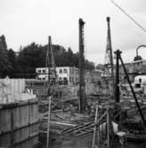 Lagerbyggnad 110 och 111 under uppbyggnad på Papyrus fabriksområde, 26/9-1945.