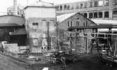Lagerbyggnad 110 och 111 under uppbyggnad på Papyrus fabriksområde, 25/7-1945.