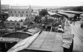 Lagerbyggnad 110 och 111 under uppbyggnad på Papyrus fabriksområde, 24/9-1945.