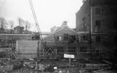 Lagerbyggnad 110 och 111 under uppbyggnad på Papyrus fabriksområde, 10/12-1945.