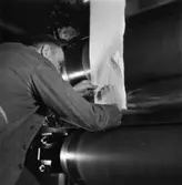 Säkerhetstjänst, glätt.
En man med på bilden.