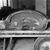 Midget-Refiner, skadade ändgavlar.