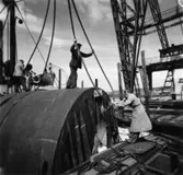 PM 2 N Yankeecylinder, transport.
En grupp okända män.