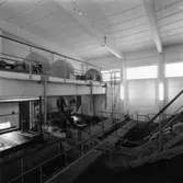 Nya renseriet på Papyrus, den 10/8-1961.
En man är med på bilden.