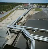 Exteriörbild från Papyrus Nymölla AB. Ledning från massabruket.