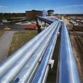 Exteriörbild från Papyrus Nymölla AB. Ledning från massabruket.