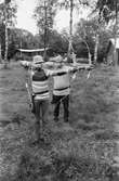 Bågskyttar i Lindome bågskytteklubb, år 1983. Jan-Erik och Morgan Lundin.

För mer information om bilden se under tilläggsinformation.