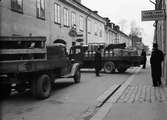 Lastbilar på Järnbrogatan, nuvarande S:t Olofsgatan, Uppsala
