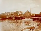 Sveriges Förenade Trikåfabriker, kraftstationen och fabriksbyggnader.
Slussbron.