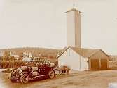 Örsundsbro Brandstation, brandbil av märket: Packard, fyra brandsoldater.