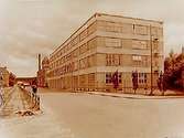 Sveriges Förenade Textilfabriker, fyra vånings fabriksbyggnad.
