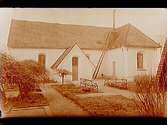 Exteriör av Almby kyrka.
Före restaurering.