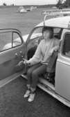 Campingplatsen bra i Gustavsvik 12 juli 1965

Kvinna sitter i bil och röker