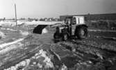 Snömodd och översvämning bland annat i Varberga 1 februari 1966

Traktor i vattensamling på vintrig gata