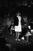 Korsettuppvisning 26 april 1965

Yngre kvinnlig modell i kjol, skjorta & jacka med rosetter i håret.
Firma Härold, Hagenfeldts personalvisning på Frimis.