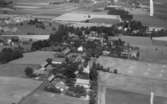 Flygfoto över Ekeby.
Bilden tagen för vykort.