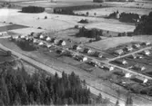 Flygfoto över Ekeby.
Bilden tagen för vykort.