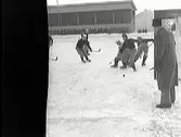Bandy. ÖSK-AIK, situationsbilder.