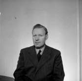 En man, bröstbild.BergströmOscaria Skofabrik.