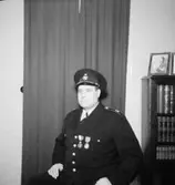 En man i uniform.
Fredelius