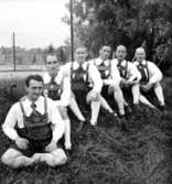 Tyroler orkestern, sex utklädda män vid Eyravallen.