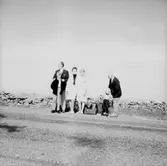 Familjegrupp sex personer, resa.