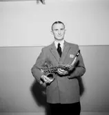 Whispering Band på Teknis, en man med musikinstrument (saxofon).