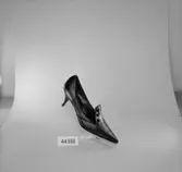 En sko. Nr: 44698.
Oscaria Skofabrik.