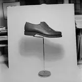 En sko.
Oscaria Skofabrik.