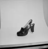 En sko.
Oscaria Skofabrik.