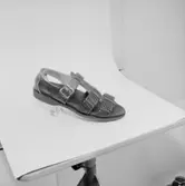 En sko.
Oscaria Skofabrik.