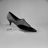 En sko.
Oscaria Skofabrik.