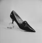 En sko.
Oscaria Skofabrik.