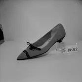 En sko.
Oscaria Skofabrik.