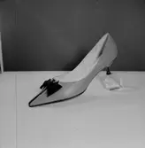 En sko.
Oscaria Skofabrik.