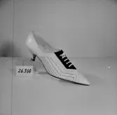 En sko.
Oscaria Skofabrik.