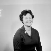 En kvinna, bröstbild.
Örebro Sparbank.