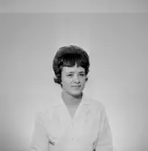 En kvinna, bröstbild.
Örebro Sparbank.