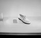 En sko.
Oscaria Skofabrik.