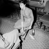 Oscaria skoaffär, interiör, skoprovning.
Bilden tagen för annons.