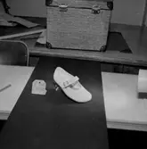 En sko.
Oscaria Skofabrik.