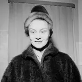 Oscaria Skoaffär, interiör, en kvinna.