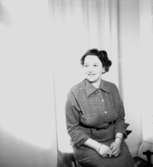 En kvinna.Fru Blomé