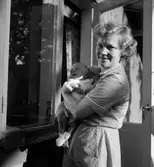 En kvinna och en baby.
Moritz