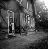 Bostadshus, en kvinna.Italien