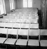 Idrottshuset, interiör, stolar.
Topp Industri