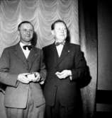 Två män.I.F. Eyra, 20 årsjubileum.